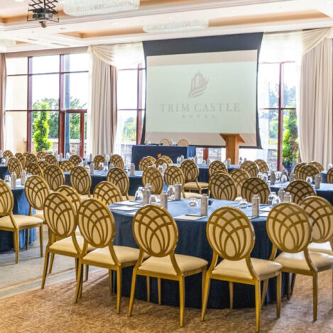 Elegant conference room with round tables, set for a meeting at Trim Castle Hotel.